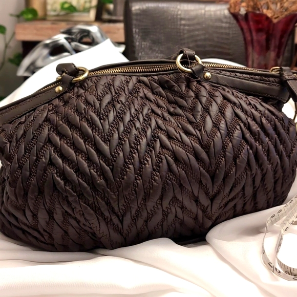 Here is a 70th anniversary edition Coach bag - Picture 9 of 15